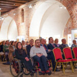 Uczestnicy podczas wernisażu wystawy pt. Wieliczka i Malbork - śladami zabytków UNESCO
