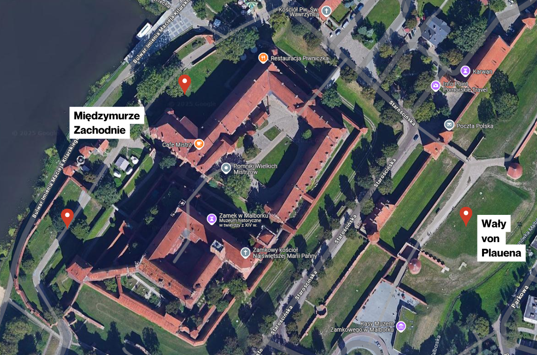 Aerial map view of expansive red-roofed fortress complex beside river, labeled points of interest.